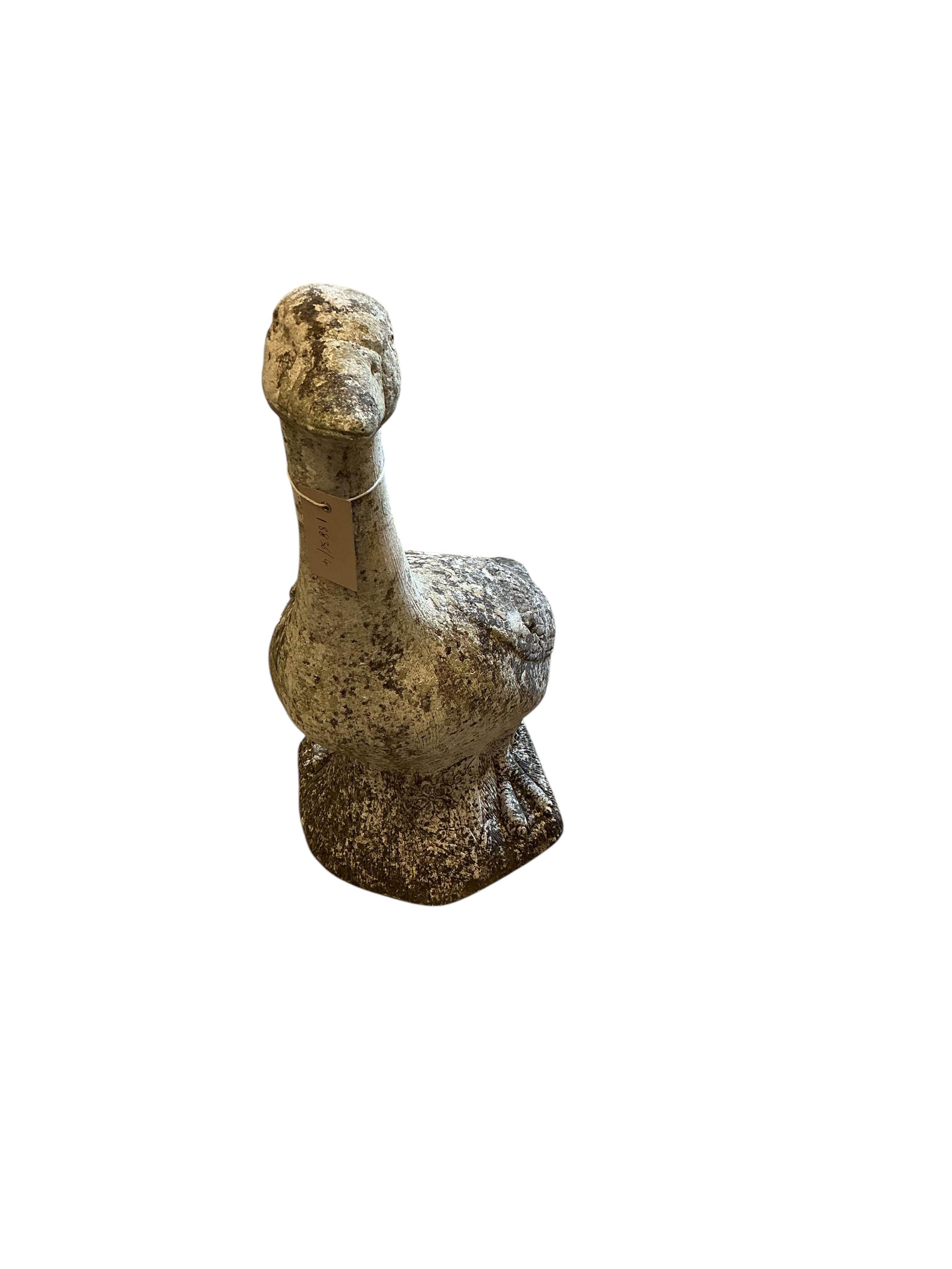 A reconstituted stone goose garden ornament, height 57cm